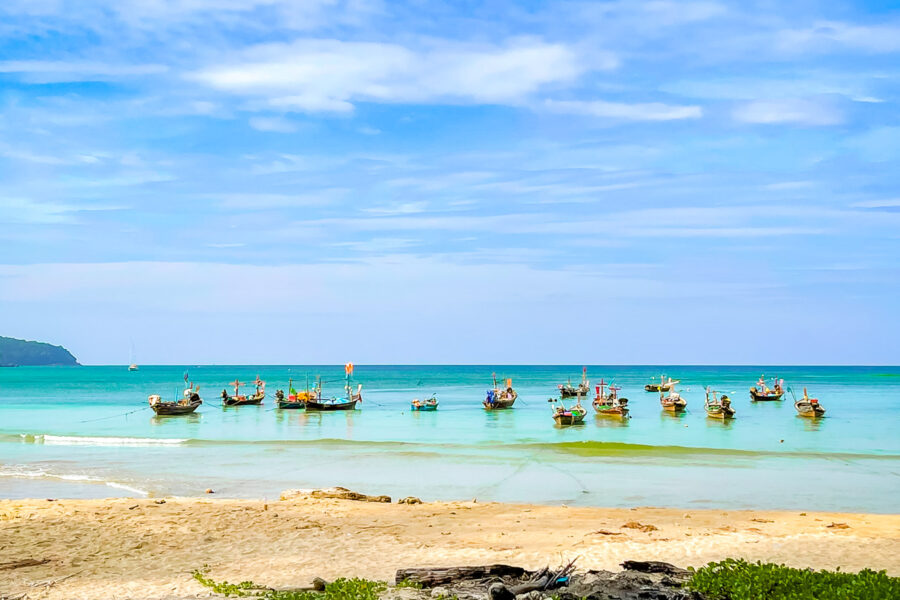 Group of boats at a beautful beach in Thailand